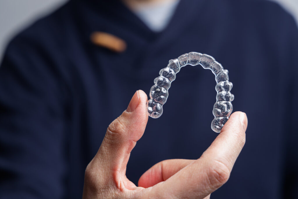 Straighten teeth with Invisalign