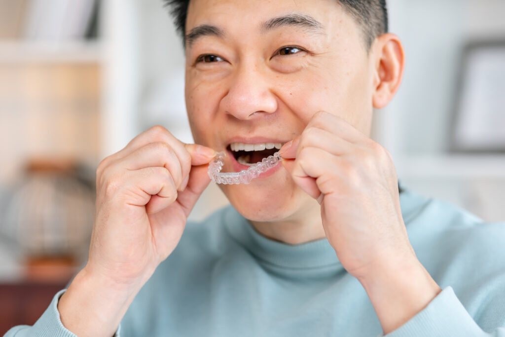 Close-up of man wearing orthodontic