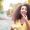 Beautiful smiling African black woman is holding invisaligner. Includes copy and text space.