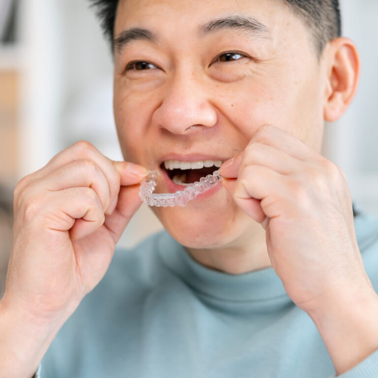 Close-up of man wearing orthodontic