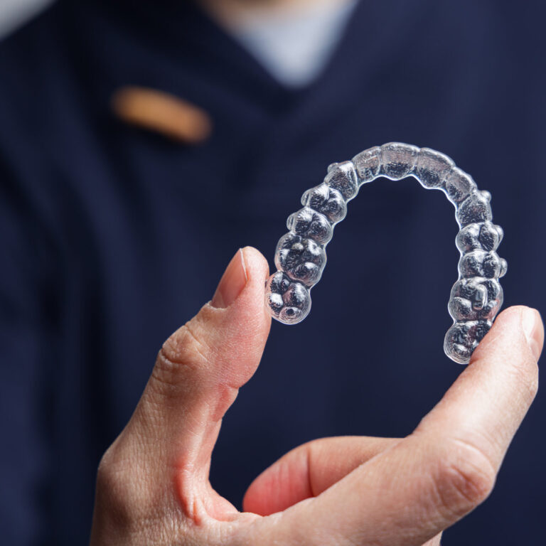 Straighten teeth with Invisalign