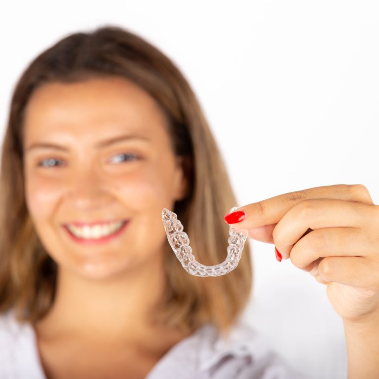 Invisalign Slowly Changes Your Smile, Here's What to Look For